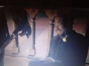 It looks like Father Gabriel has def seen, and done, some dark things to survive.