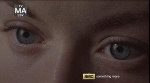 Beth opens her eyes, takes in her unfamiliar surroundings.