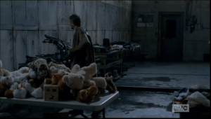 carol picks up daryls crossbow