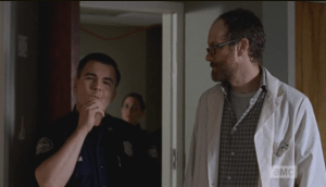 ...and with that, Gorman gestures a mocking farewell to Beth with the lollipop, sticks it back in his mouth as he leaves the room.