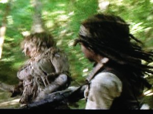 With a little smile, Michonne tells the gang, no worries, I got this...and with a little smile on her face, she takes out some pent up anger on the walker...you wanna party? Let's party!
