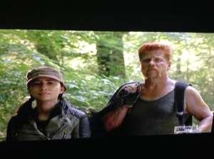 As Abraham and Rosita stop a moment to admire Michonne's handiwork, Abraham murmurs,