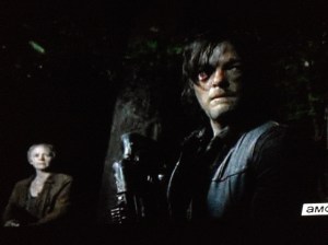 As Daryl listens, the woods settle down to silence once more.