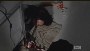 ...poor Joan's body, after cutting her own wrist and arm, and bleeding out. So sad, but so kind of badass too...Joan really doesn't seem to give a fuck about becoming a walker...she's like, bring it, bitch, and I'll bring the mayhem to this bunk-ass debt castle.
