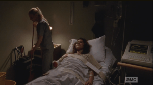 Beth puts down her mop, offers to go get Doctor Edwards, but Joan stops her,