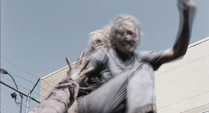 Upon seeing a walker woman on the ground, hissing and reaching up for her, Beth does the Walker Stomp on the walker's head...