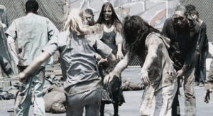 Beth must fight off the ATL Walkers hand-to-hand style...she is getting overrun, while Noah continues to make a break for it towards the last fence.