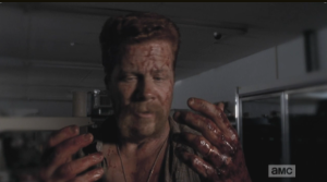Abraham looks down at his bloody hands, whispers, 
