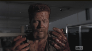 Abraham looks down at his bloody hands, whispers,