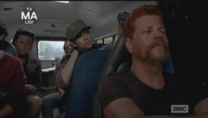Abraham practically purrs while Rosita plays with his hair, remarking,