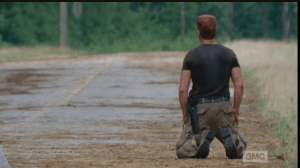 Abraham walks away, down the road a bit, sinks to his knees...