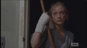 Beth shoots Doc Edwards the stink eye on the DL as he checks on Carol...then stalks out of the room.