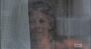 The next morning, Carol awakes, sees smoke billowing outside the window. She goes to the window, and what she sees brings her to tears...