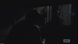 Carol turns to Daryl, tells him,
