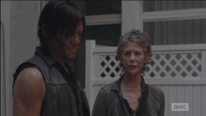 Carol comes and stands beside Daryl. They watch the bodies of the mother and child burn for a moment, then Carol turns to Daryl and says,