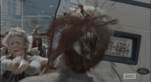 Carol uses one of her last three bullets...