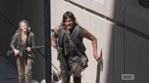 Daryl and Carol keep close to the sides of the buildings, running quietly through the streets of Atlanta. Hug the shadows, hug the shadows, Daryl and Carol!