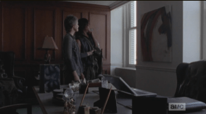 As they look at the painting, Daryl says that it looks like