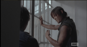 Daryl listens, looks down a moment, taps the tip of the machete into the windowsill...he then gives Carol this sweet, beautiful, manly look, and then says the perfect thing,