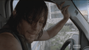 They quickly get to the front seats, buckle themselves in...Daryl tells Carol to hold on...