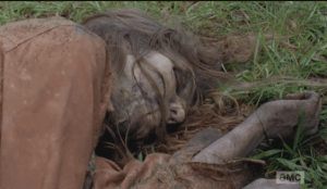 Eugene forms a gob of spit in his mouth, and unleashes his spit upon his first ever walker kill.