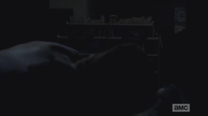 Abraham and Rosita turn to look, and Rosita says,