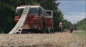 Her voice breaking slightly, Maggie slams the fire truck door shut, and walks away, telling Abraham that,