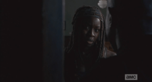 Michonne replies that she doesn't want anything from him...she was just making sure he was ok. Gabriel thanks her, closes the door...