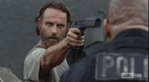A click of a gun, and Officer Baldy looks up to see Rick Smash! holding a gun to his head...cue the Rick Smash! Bear McCreary theme music, dark and pulsing...Rick Smash! wants to SMASH!