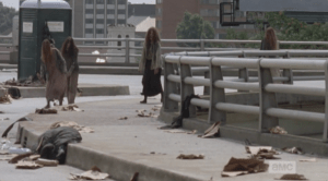 Behind them, a small group of walkers have seen them and are coming their way...they are still a ways off.