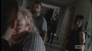In one quick instant, Beth stabs Dawn Lerner with the scissors...