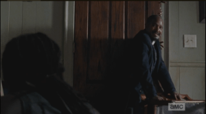 Gabriel finally steps up, bravely barring the door to allow Carl, Judith, and Michonne to escape through the crawlspace under the church.