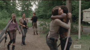 The gang reunites, and Michonne, smiling, tells Maggie that Beth is alive, in a hospital in Atlanta, and the others have gone to go get her back.