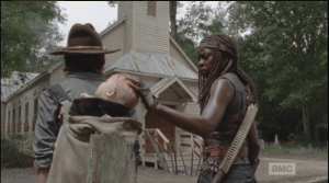 As Gabriel takes a rest, Michonne touches Juith's sleeping head (and that, my readers, is all a stunt baby should be expected to do...look adorable, and take a nap!).