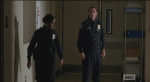 officer OD challenges beth as dawn walks past percy
