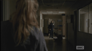 ...to no avail, as Officer OD mocks and shoves the elder gentleman to the floor, then sees Beth watching...