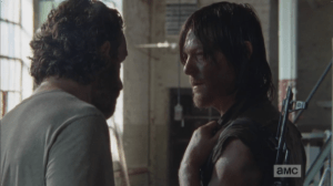 Rick pulls Daryl aside.