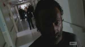 At Dawn's words, Rick stops in his tracks. He turns to Dawn, walks back towards her,