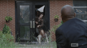 The Schoolhouse Walkers bust through the glass doors and start pursuing Gabriel...