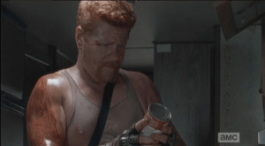 abraham looks down at the can remembering