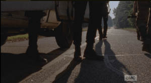 boots coming out of truck