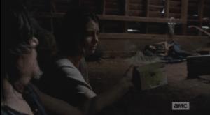 Daryl then hands Maggie the music box, saying, simply,