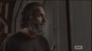 Still peering out, Rick replies,