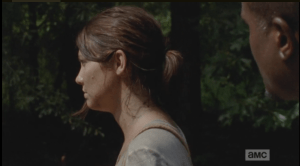 Staring straight ahead, Maggie replies,