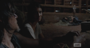 Maggie thanks Daryl, smiling sweetly at him, and then gets up, music box in hand, and goes over to wake up Sasha. 