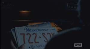 ...when Rick finds Aaron's license plate collection in the glove compartment. At Rick's questioning look towards Glenn, Aaron leans forward from the back seat.