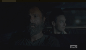 Rick, looking ahead at the road, awaits Aaron's answer...he hems and haws before answering, a trifle defensively,