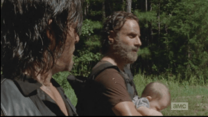 Rick pulls Judith up a little closer to him.
