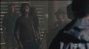 Aaron, of course, does, says nothing about Rick's taking his gun. Rick asks Aaron, softly, 