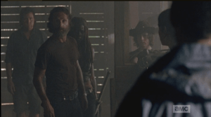 Aaron, of course, does, says nothing about Rick's taking his gun. Rick asks Aaron, softly,